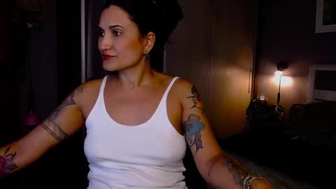 My alter ego Betinna Flowers - a tattooed Miss  -   Are you missing me come in here  -  online show from 01.19.25